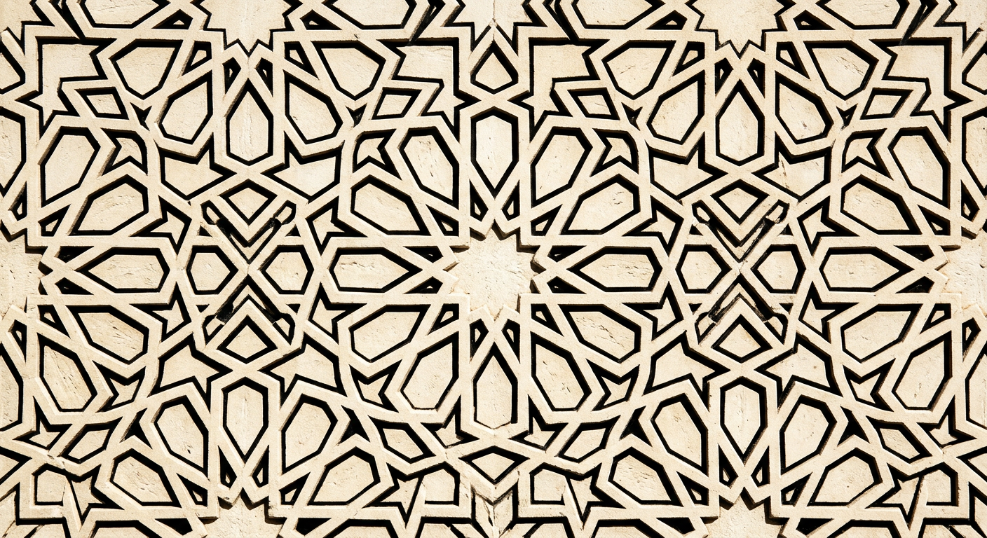 Close-up of a geometric star-and-polygon pattern carved into pale stone